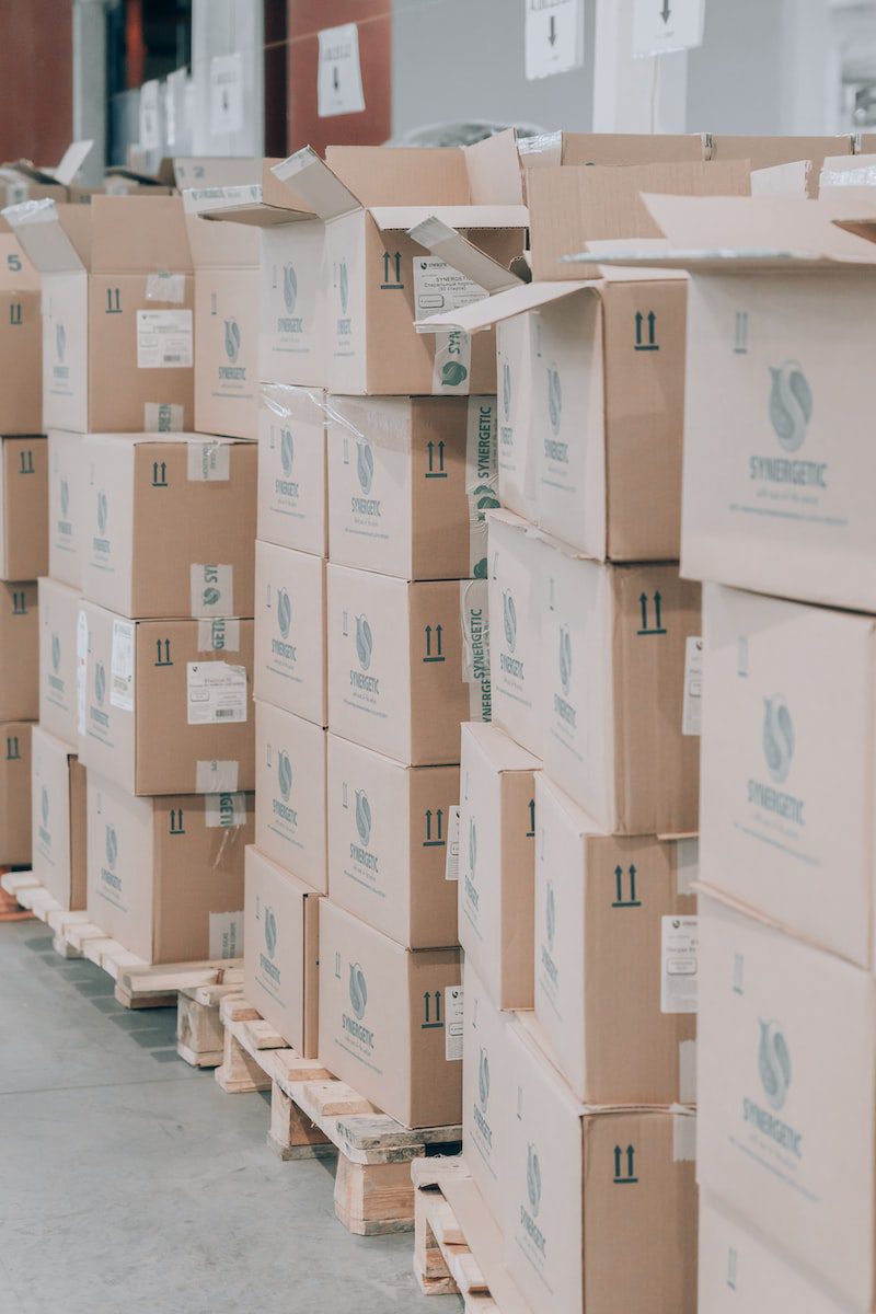 brown cardboard boxes on white floor